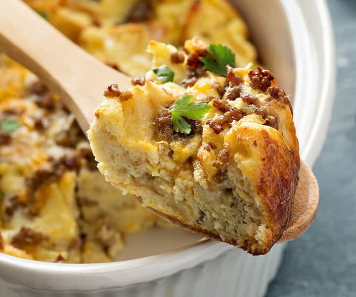 a spoonful of food in a casserole dish